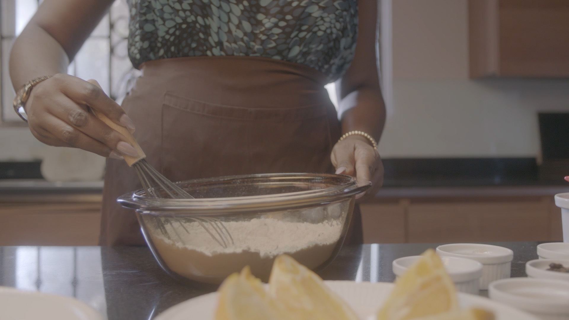 Hands mixing a microbiome-directed food